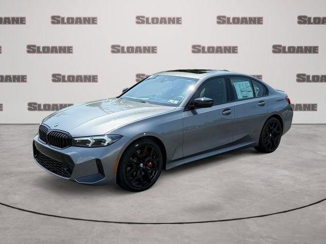 2026 BMW 3 Series 330i xDrive in Gray Metallic — front three-quarter view