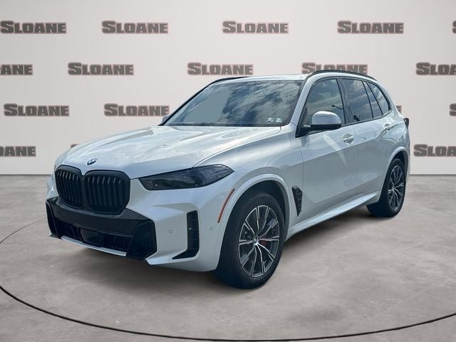 2026 BMW X5 xDrive40i in Mineral White Metallic — front three-quarter view