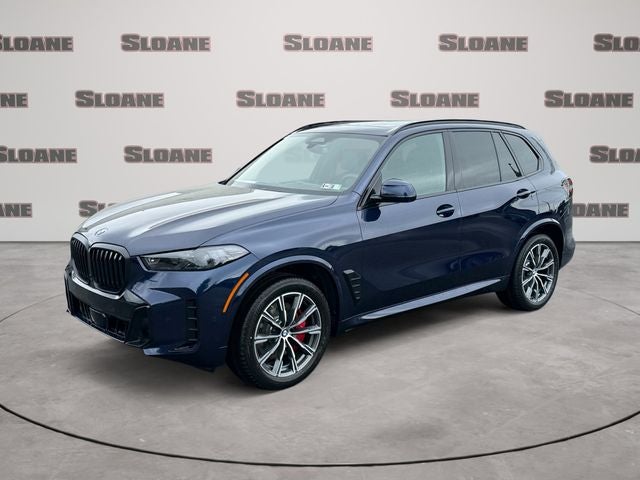 2026 BMW X5 xDrive40i in Blue — front three-quarter view