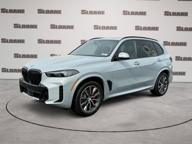 2026 BMW X5 xDrive40i in Gray Metallic — front three-quarter view