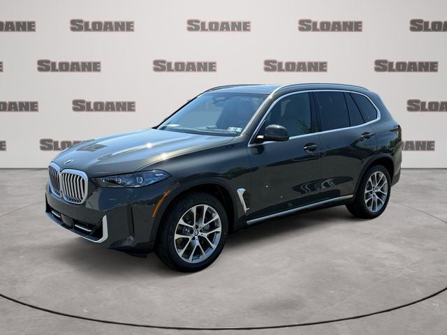 2026 BMW X5 xDrive40i in Gray Metallic — front three-quarter view