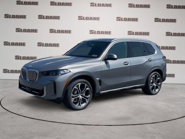 2026 BMW X5 xDrive40i in Gray Metallic — front three-quarter view