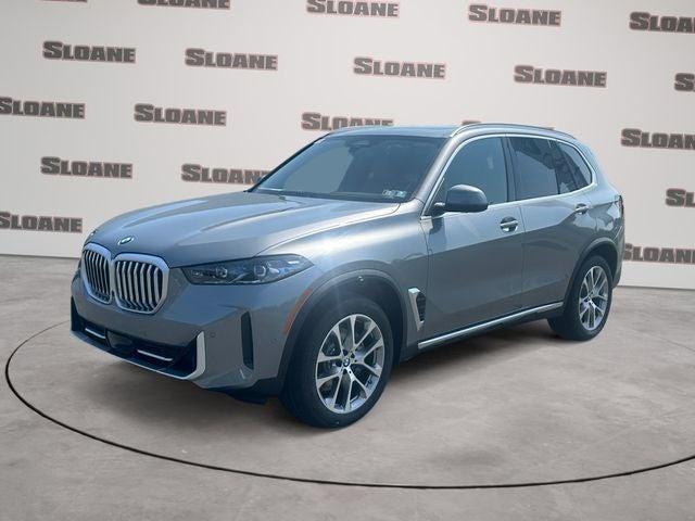 2026 BMW X5 xDrive40i in Gray Metallic — front three-quarter view
