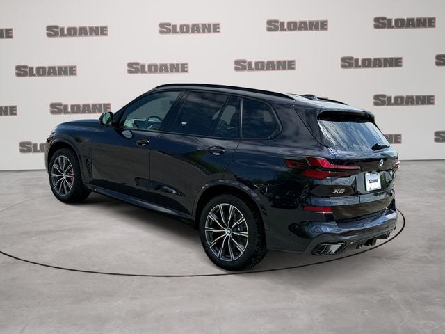 2026 BMW X5 — rear three-quarter view