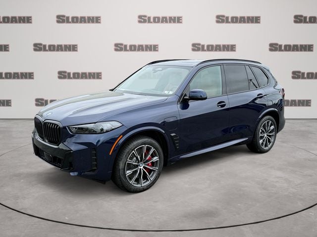 2026 BMW X5 xDrive50e in Blue — front three-quarter view