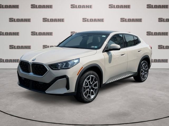 2026 BMW X2 xDrive28i in Gray Metallic — front three-quarter view